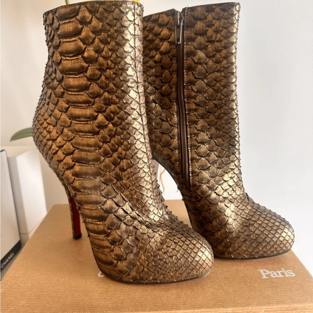 Christian Louboutin booties. High heels with inside platform Lizard skin Sz 7